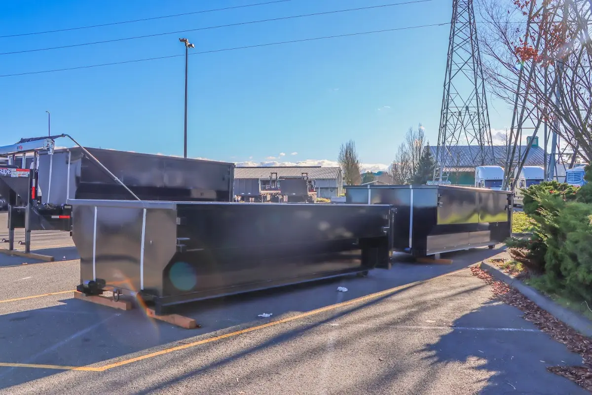 Roll-off dumpster ready for waste disposal at job site for Construction Dumpster Rental in Livingston